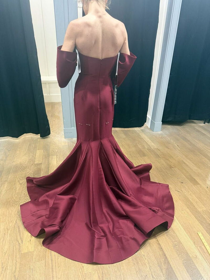 Burgundy duchess satin mermaid gown with a sweeping train