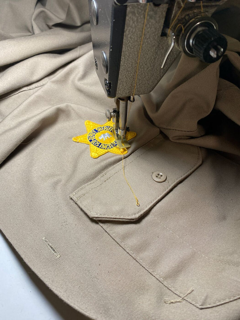 Applied patchwork and repair on a client garment